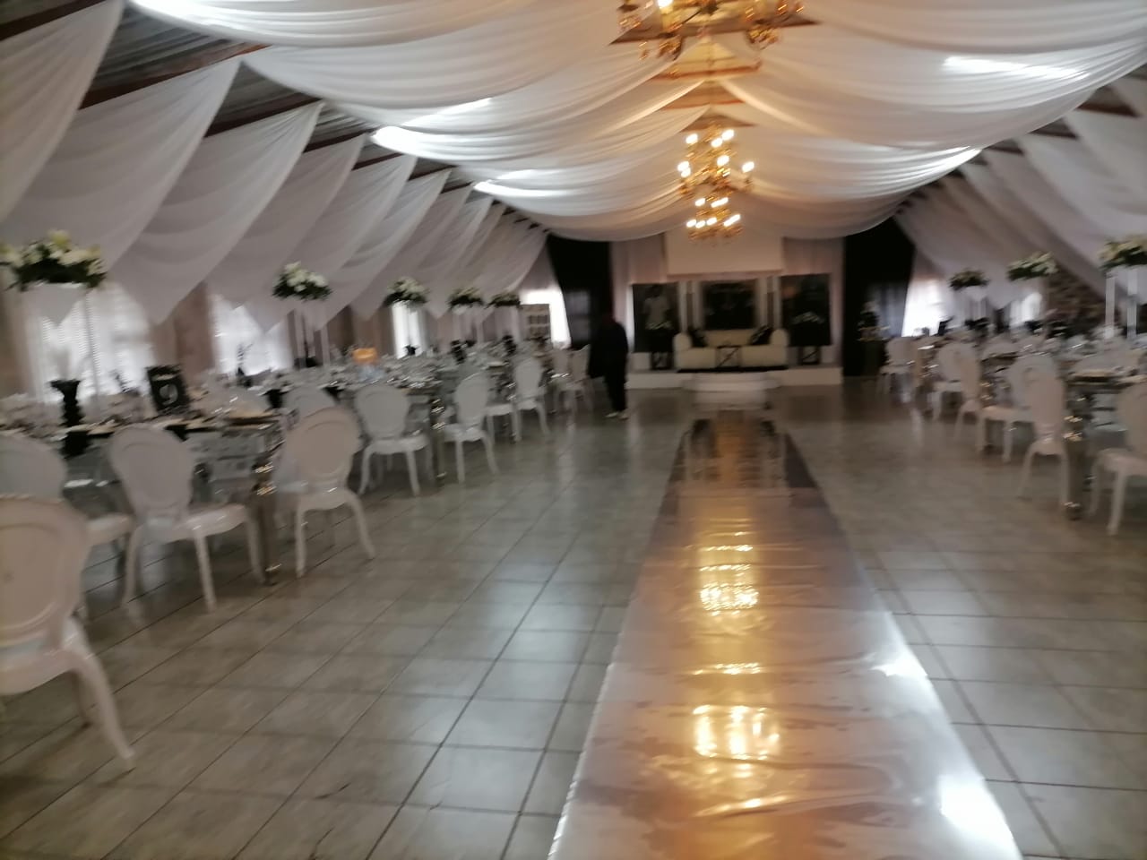 Spacious event venue with stylish lighting - Lady D Events & Decor