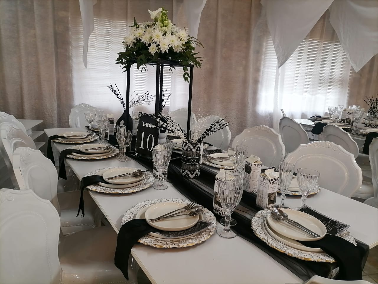 Corporate event with sophisticated seating arrangement - Lady D Events & Decor